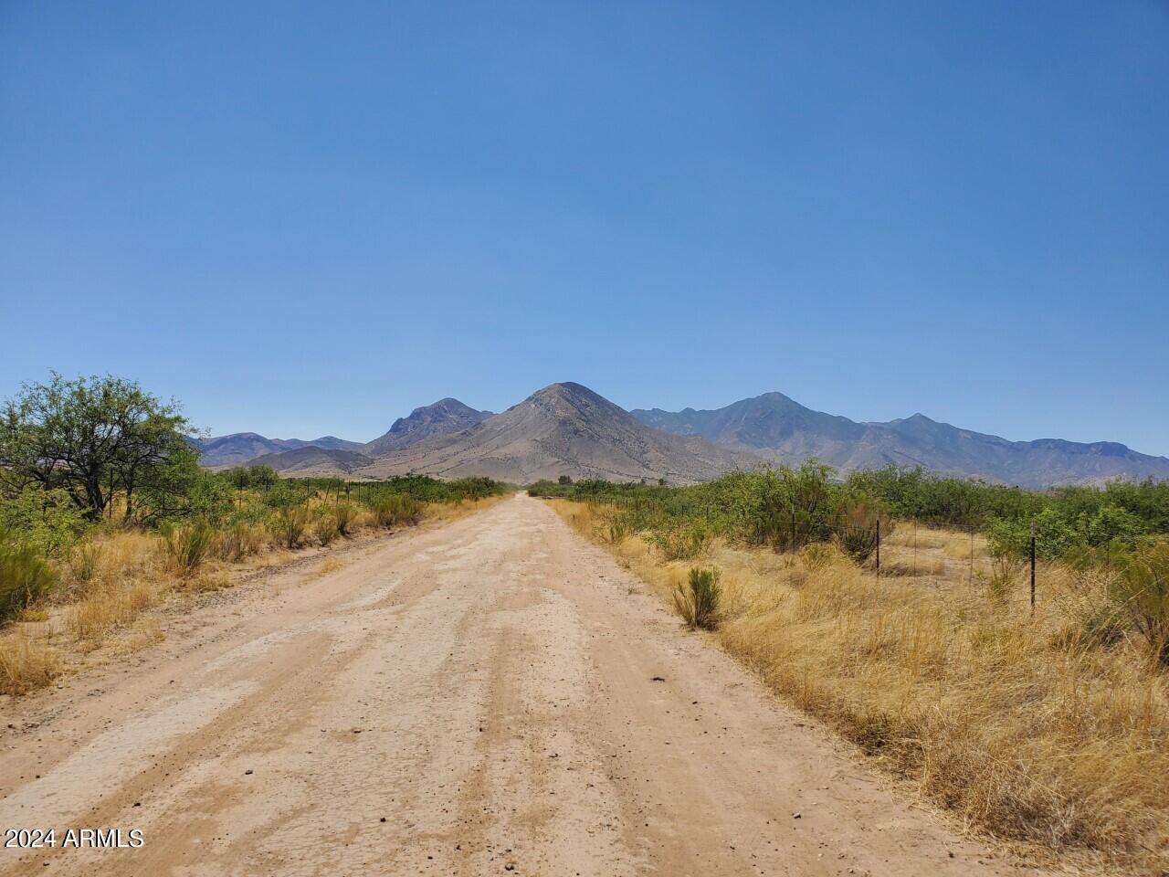 4-acres East Lane Ranch Road Hereford, AZ 85615 - Photo 4 of 9 a view of lake with mountain