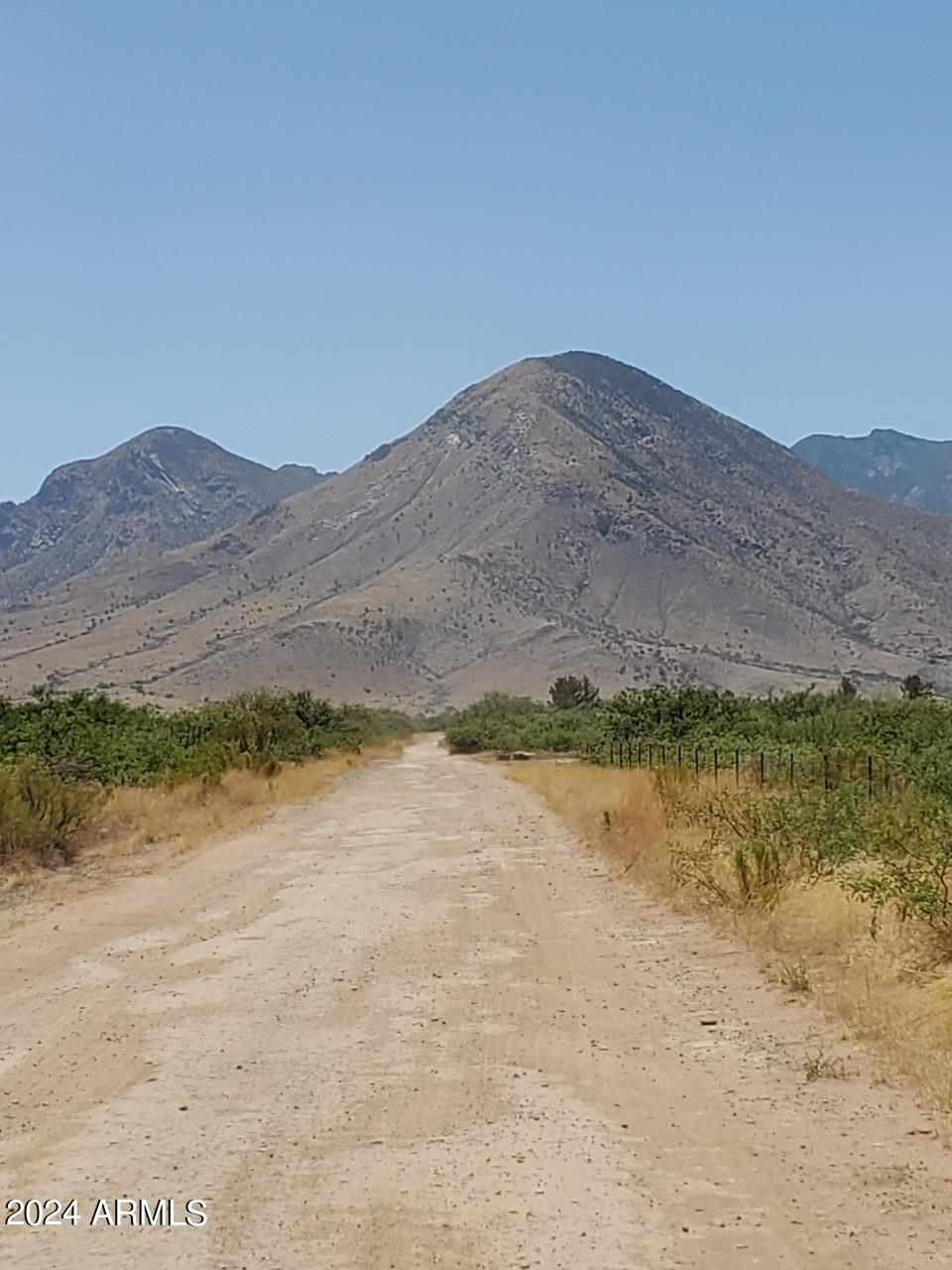4-acres East Lane Ranch Road Hereford, AZ 85615 - Photo 5 of 9 a view of lake with mountain