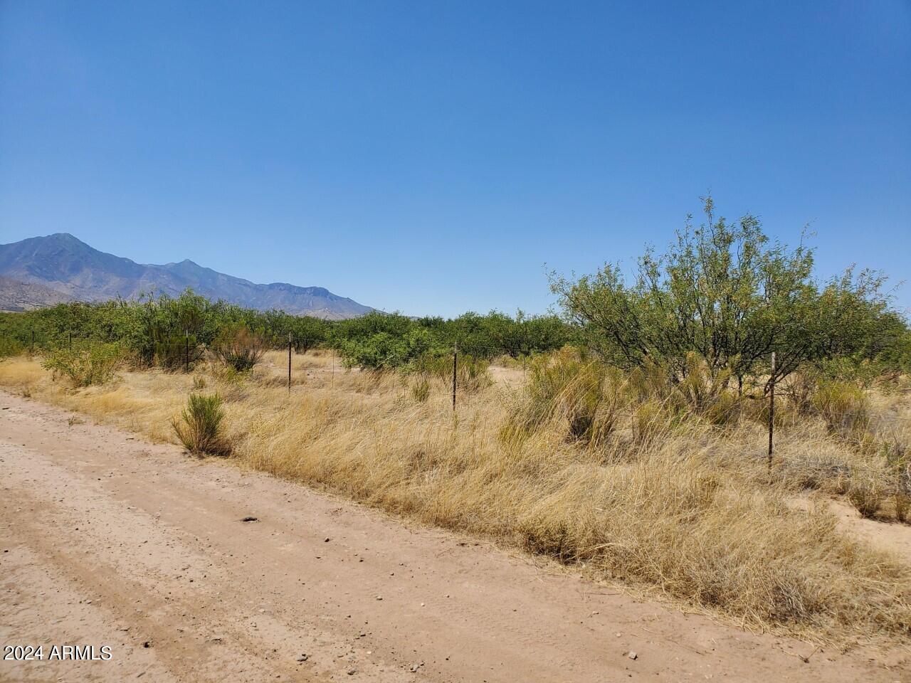 4-acres East Lane Ranch Road Hereford, AZ 85615 - Photo 6 of 9 a view of lake with mountain