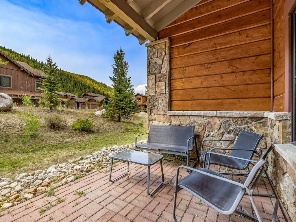 68 Independence Lane Keystone, CO 80435 - Photo 26 of 43 a backyard of a house with table and chairs