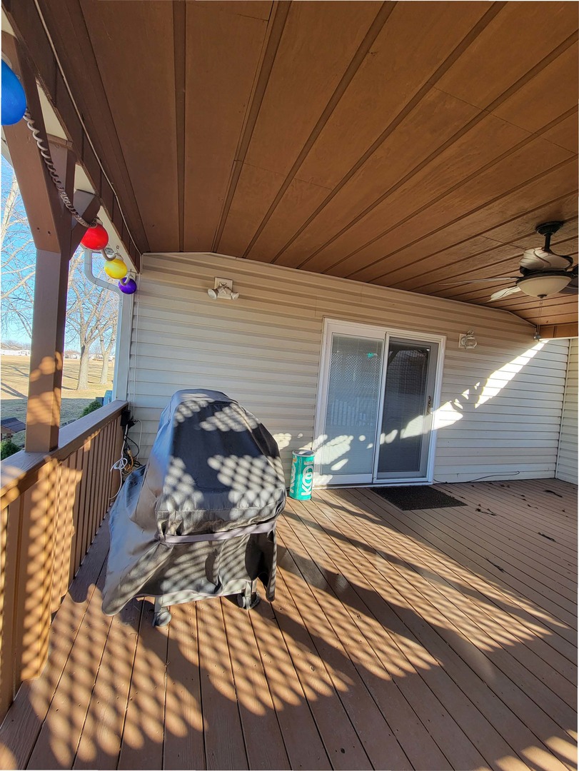 5016 West Colonial Drive, Unit 317 Monee, IL 60449 - Photo 19 of 32 a backyard of a house with seating space