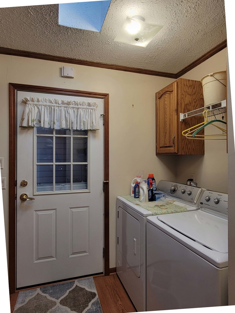 5016 West Colonial Drive, Unit 317 Monee, IL 60449 - Photo 20 of 32 a utility room with dryer and washer