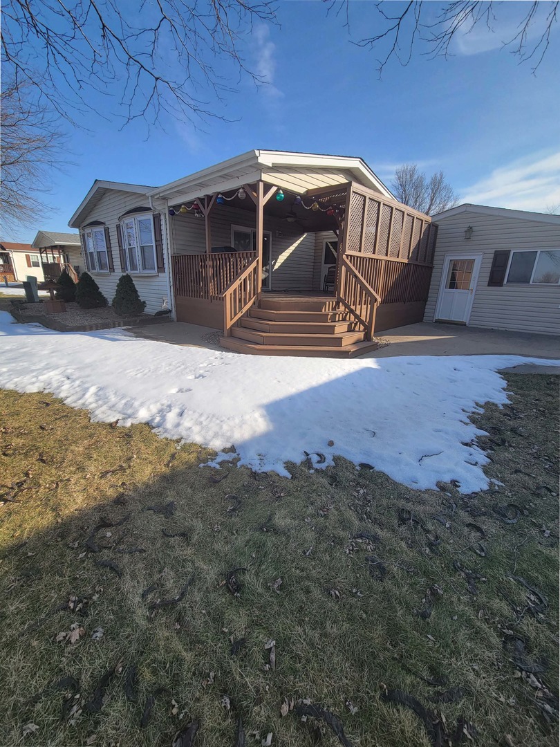 5016 West Colonial Drive, Unit 317 Monee, IL 60449 - Photo 22 of 32 a view of a house with a yard