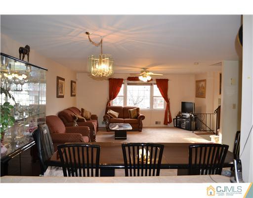 8 Roxy Avenue Edison, NJ 08820 - Photo 11 of 22 a view of a dining room with furniture and window