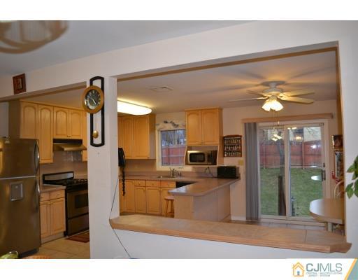 8 Roxy Avenue Edison, NJ 08820 - Photo 14 of 22 a view of a living room and kitchen