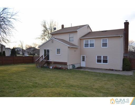 8 Roxy Avenue Edison, NJ 08820 - Photo 21 of 22 a backyard of a house with lots of green space