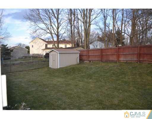 8 Roxy Avenue Edison, NJ 08820 - Photo 22 of 22 a backyard of a house with lots of green space