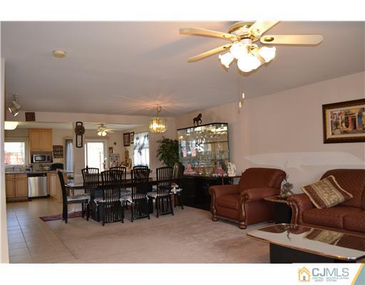 8 Roxy Avenue Edison, NJ 08820 - Photo 8 of 22 a living room with furniture