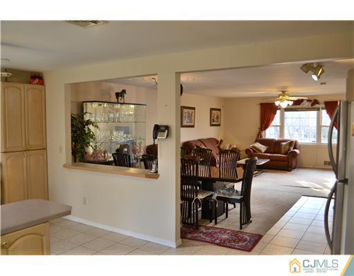 8 Roxy Avenue Edison, NJ 08820 - Photo 9 of 22 a living room with furniture
