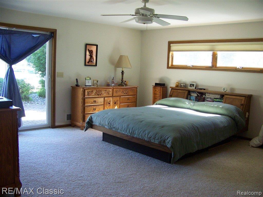 11114 Fernitz Road Byron, MI 48418 - Photo 11 of 17 Huge LL Master Bed w/ W/O Patio