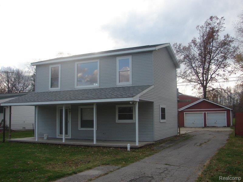 19250 Sylvia Road Romulus, MI 48174 - Photo 16 of 18 SIDE/FRONT 1