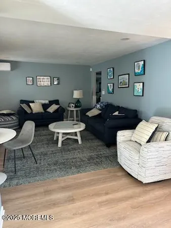 a living room with couches and a table