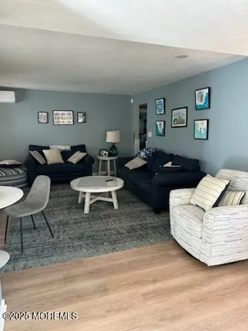 a living room with couches and a table