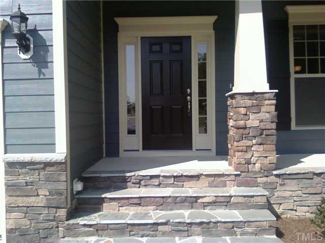 5701 Spring Glen Lane Raleigh, NC 27616 - Photo 5 of 25 a view of entrance door of the house