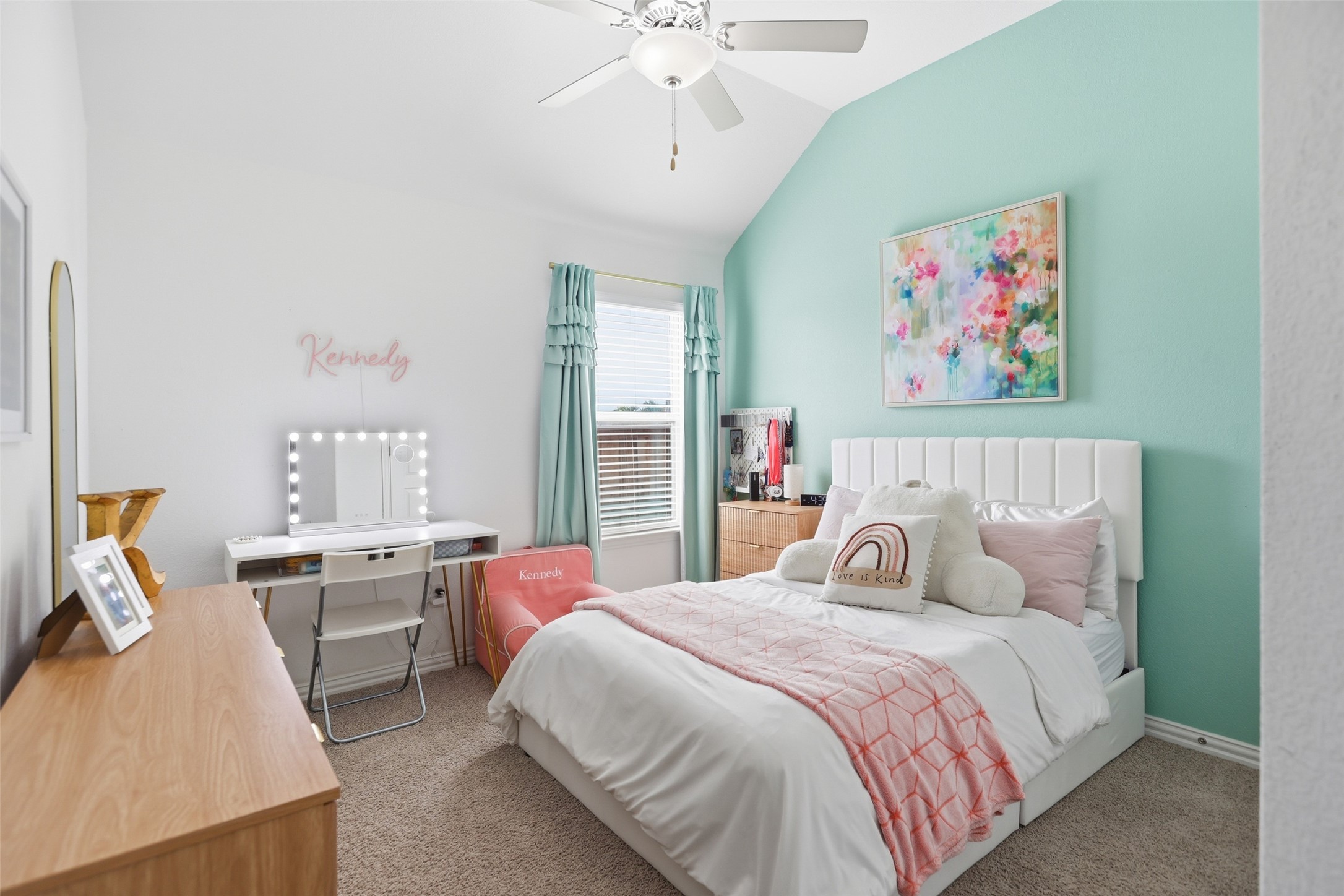 544 Cherrystone Loop Buda, TX 78610 - Photo 20 of 40 a bedroom with furniture and a chandelier