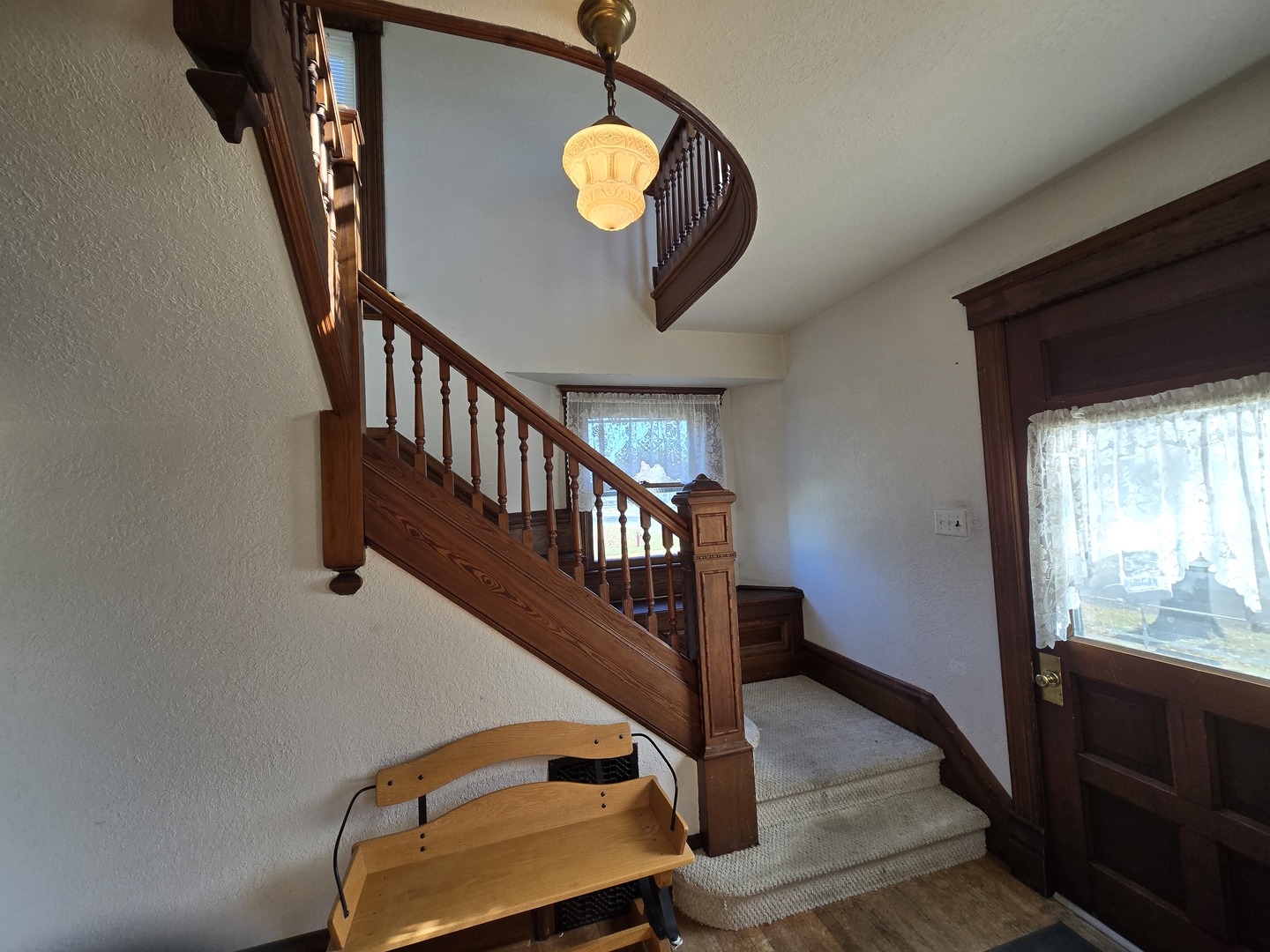 516 East Buffalo Street Polo, IL 61064 - Photo 21 of 28 a view of staircase with wooden floor and a window
