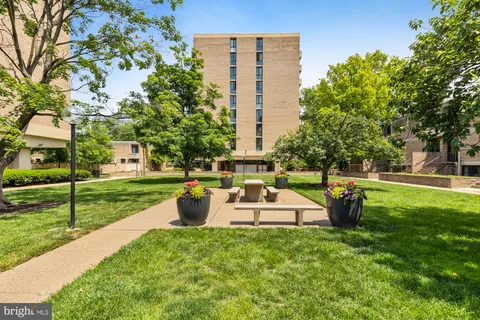 a view of a garden with a fountain