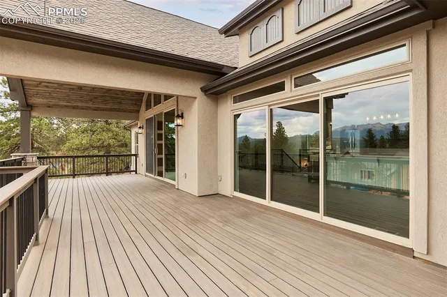 a view of a house with a large window
