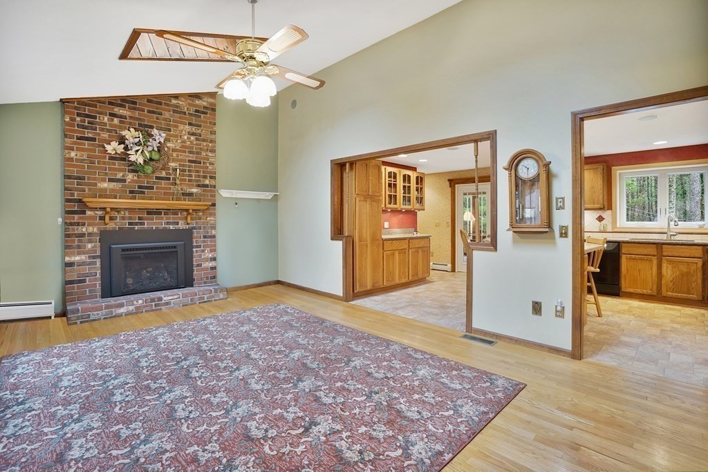 17 Pequot Road Southampton, MA 01073 - Photo 11 of 41 a view of an empty room with a fireplace