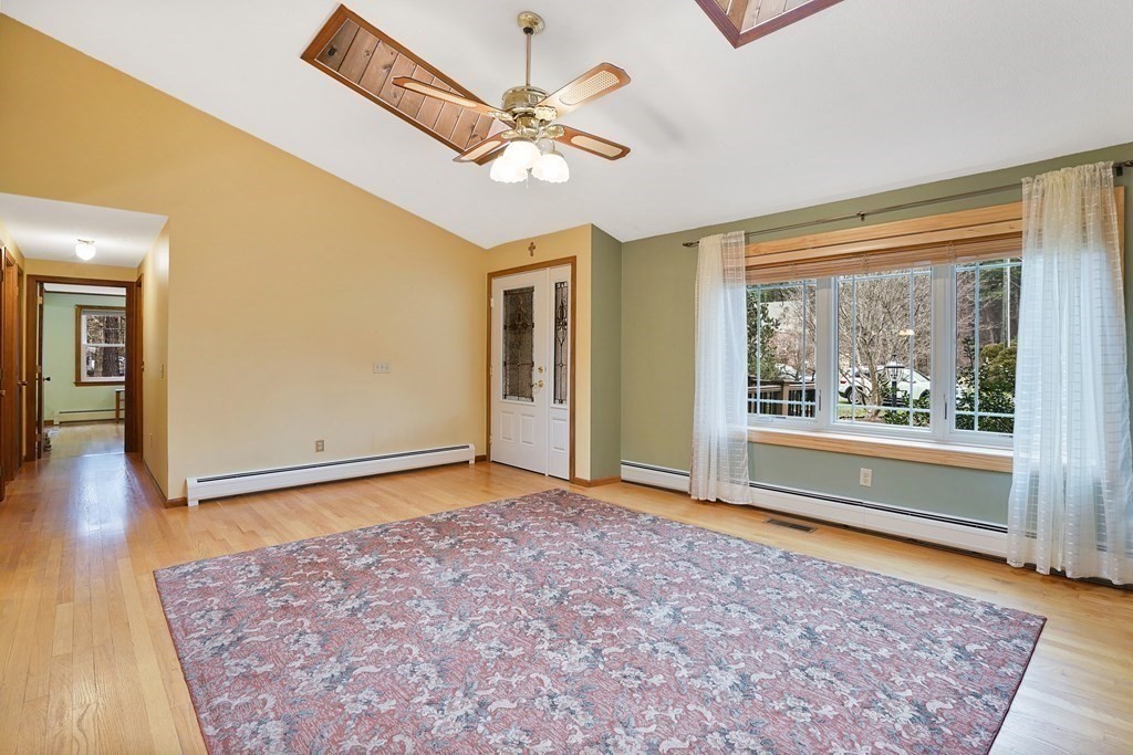 17 Pequot Road Southampton, MA 01073 - Photo 13 of 41 wooden floor in an empty room with a window