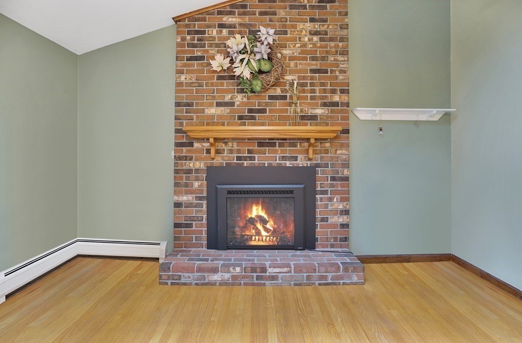 17 Pequot Road Southampton, MA 01073 - Photo 15 of 41 a living room with a fireplace