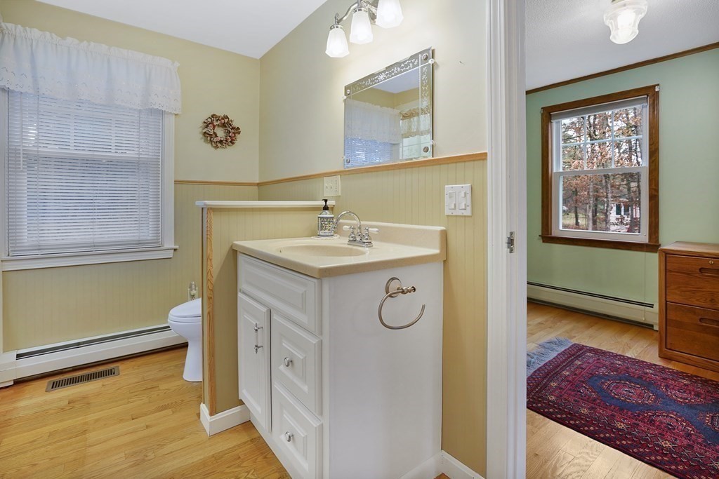 17 Pequot Road Southampton, MA 01073 - Photo 28 of 41 a spacious bathroom with a sink a mirror and a bathtub