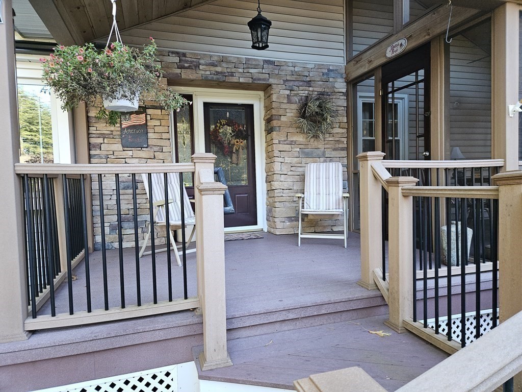 17 Pequot Road Southampton, MA 01073 - Photo 5 of 41 a view of a house with porch and wooden floor