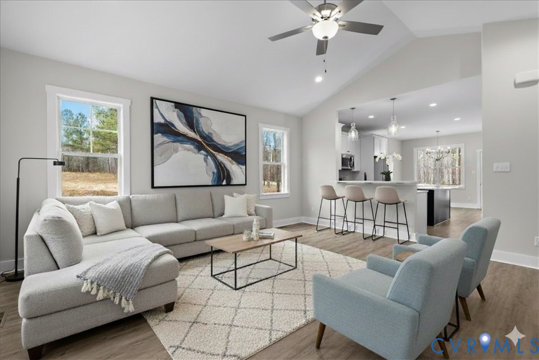 435 Raleigh Avenue South Hill, VA 23970 - Photo 2 of 11 a living room with furniture and a large window