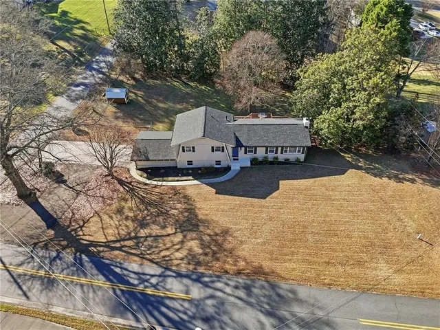 a view of a yard with an outdoor space