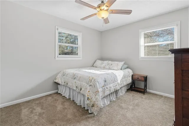 a view of a bedroom with a baby crib