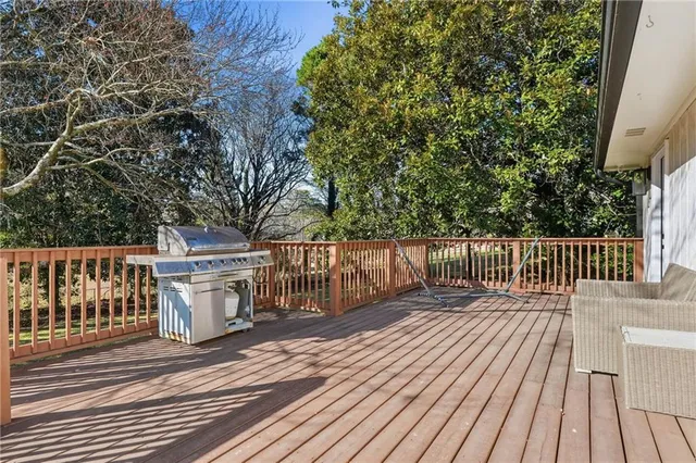 a view of a chair and table in the balcony
