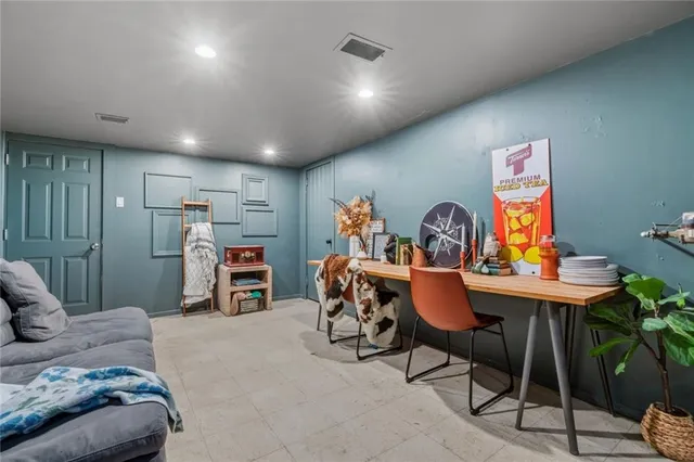 a bedroom with furniture and a bed