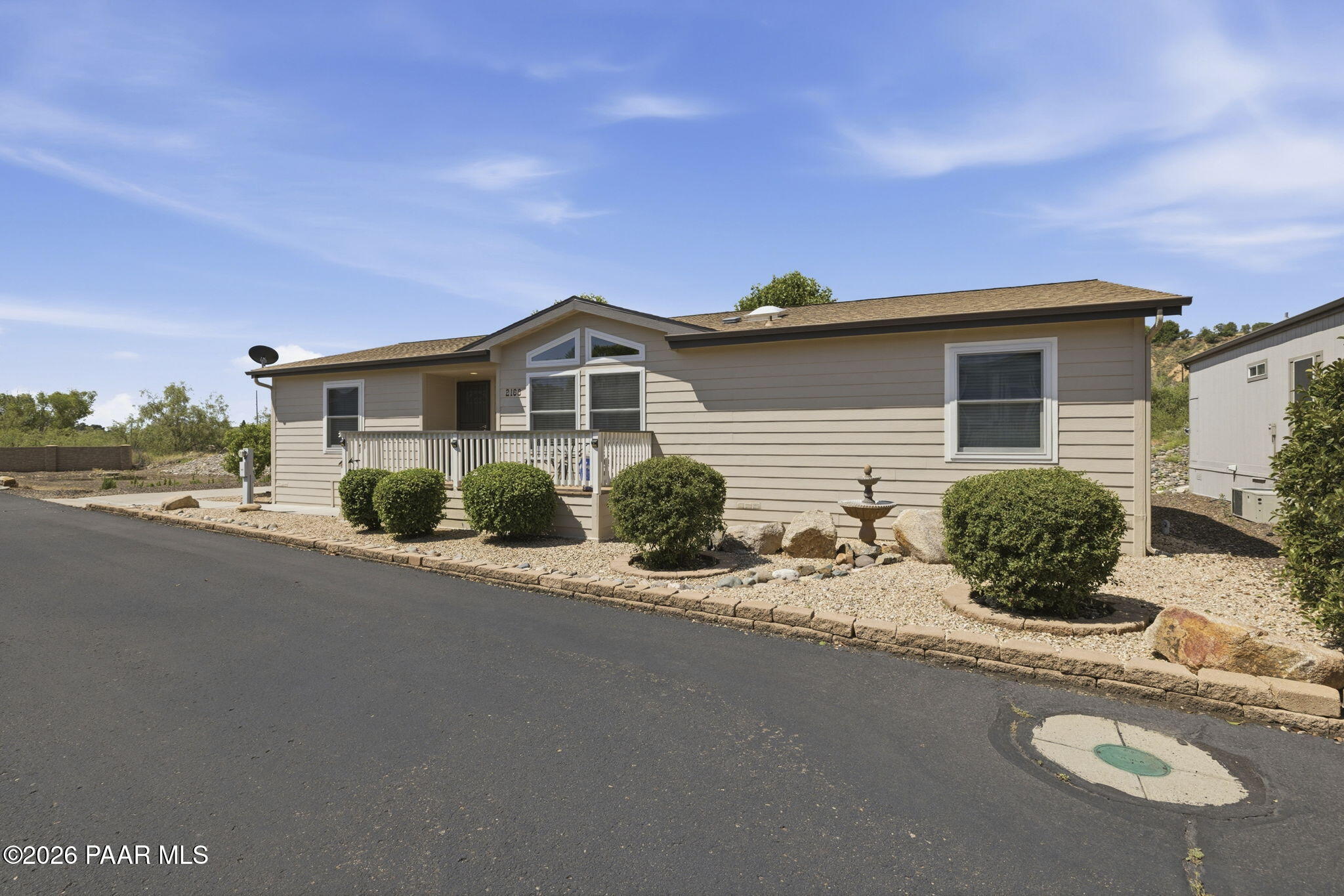11250 East State Rte 69 Dewey, AZ 86327 - Photo 5 of 38 a front view of a house with a yard