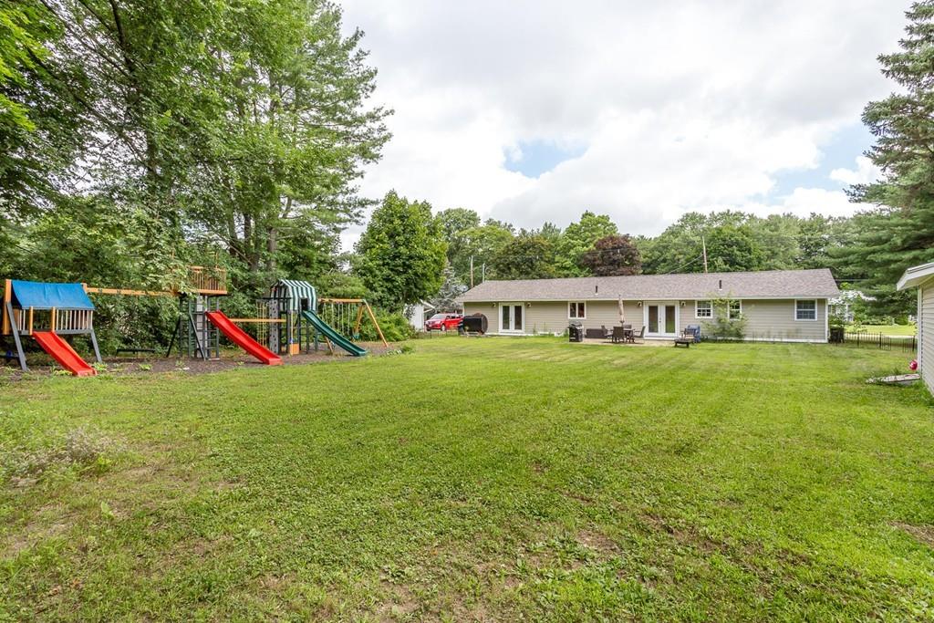 23 Wentworth Road Canton, MA 02021 - Photo 16 of 16 a view of a house with pool and a yard
