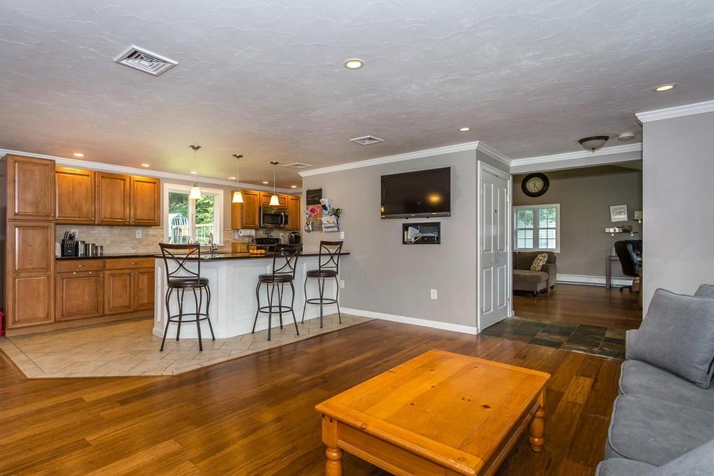 23 Wentworth Road Canton, MA 02021 - Photo 3 of 16 a room with stainless steel appliances lots of counter space and a chair