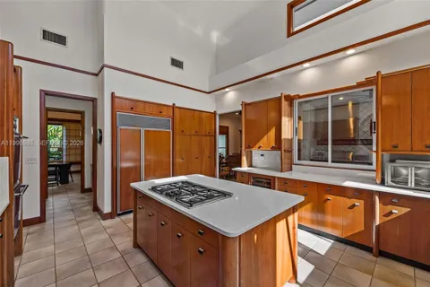 a view of a hallway with windows