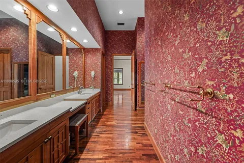 a view of a bathroom from a hallway