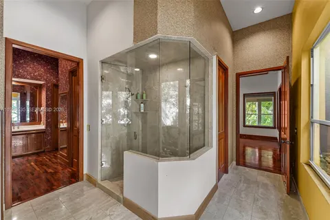 a view of room with window and ceiling fan