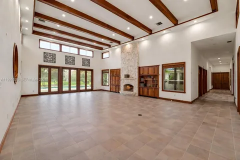 a bathroom with a sink mirror vanity and toilet