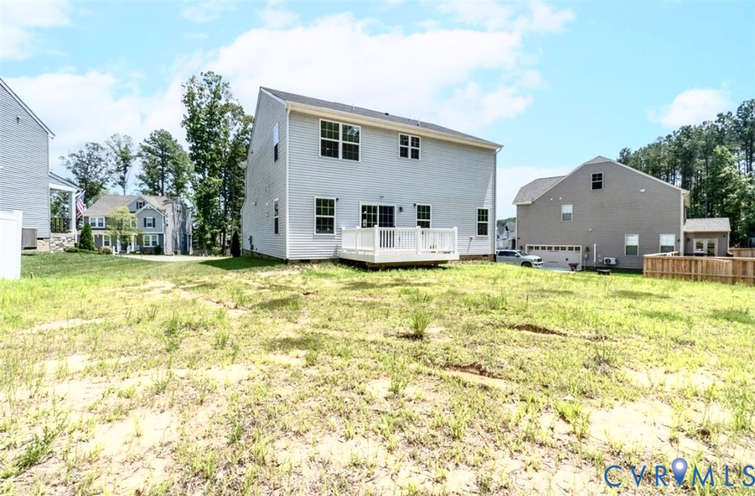 16043 Cambria Cove Boulevard Midlothian, VA 23112 - Photo 22 of 44 a view of a house with a yard and sitting area