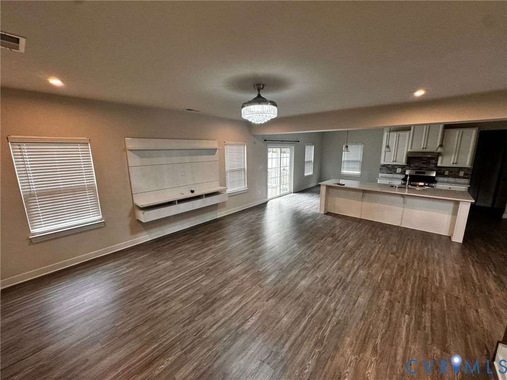 16043 Cambria Cove Boulevard Midlothian, VA 23112 - Photo 44 of 44 a view of a kitchen with a sink microwave and cabinets