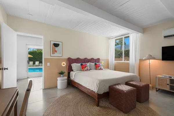 a view of a swimming pool with a patio