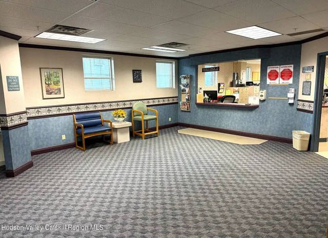 a lobby with furniture