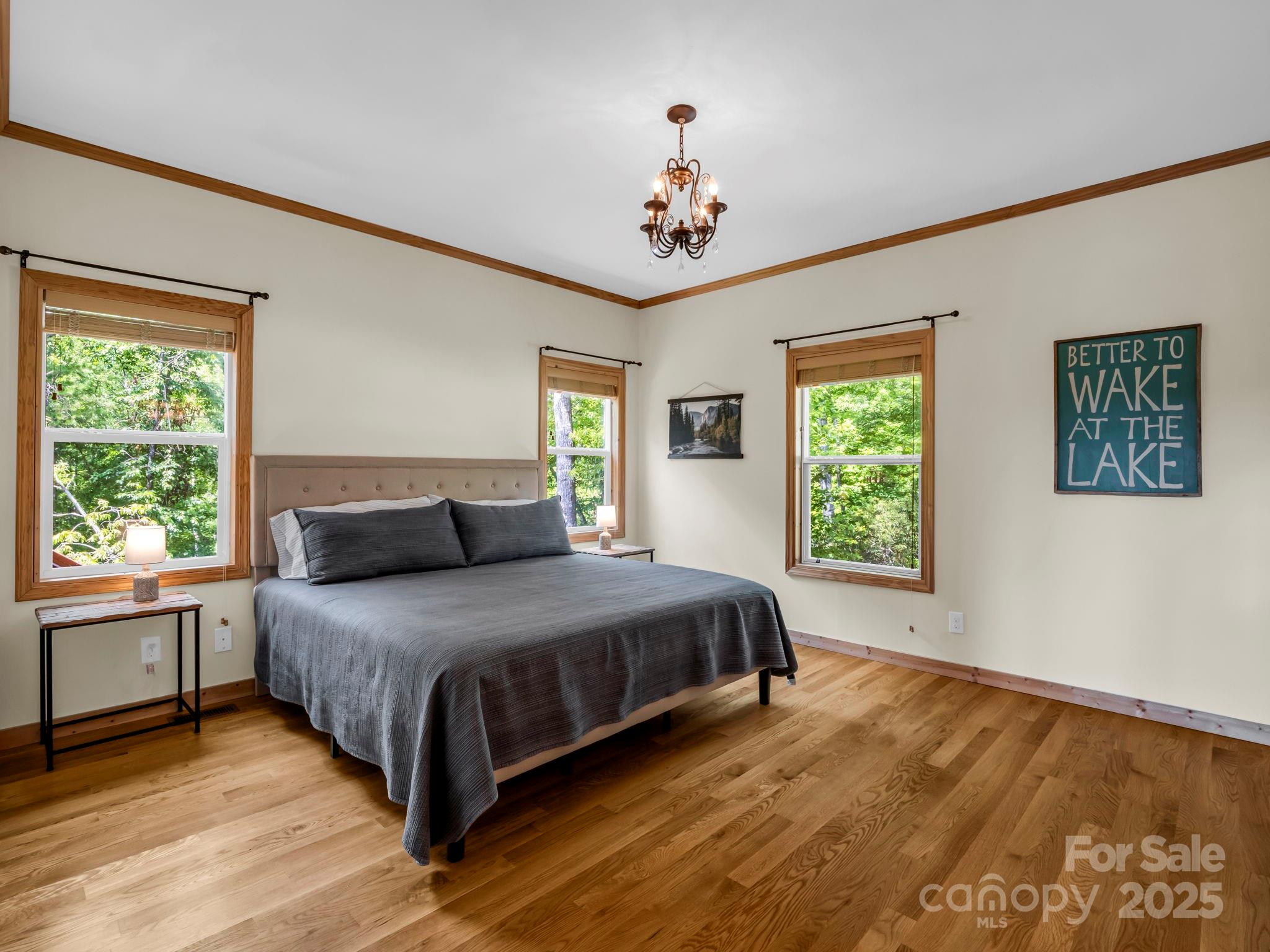 188 Fern Loop Lake Lure, NC 28746 - Photo 22 of 48 a bedroom with a large bed and a window
