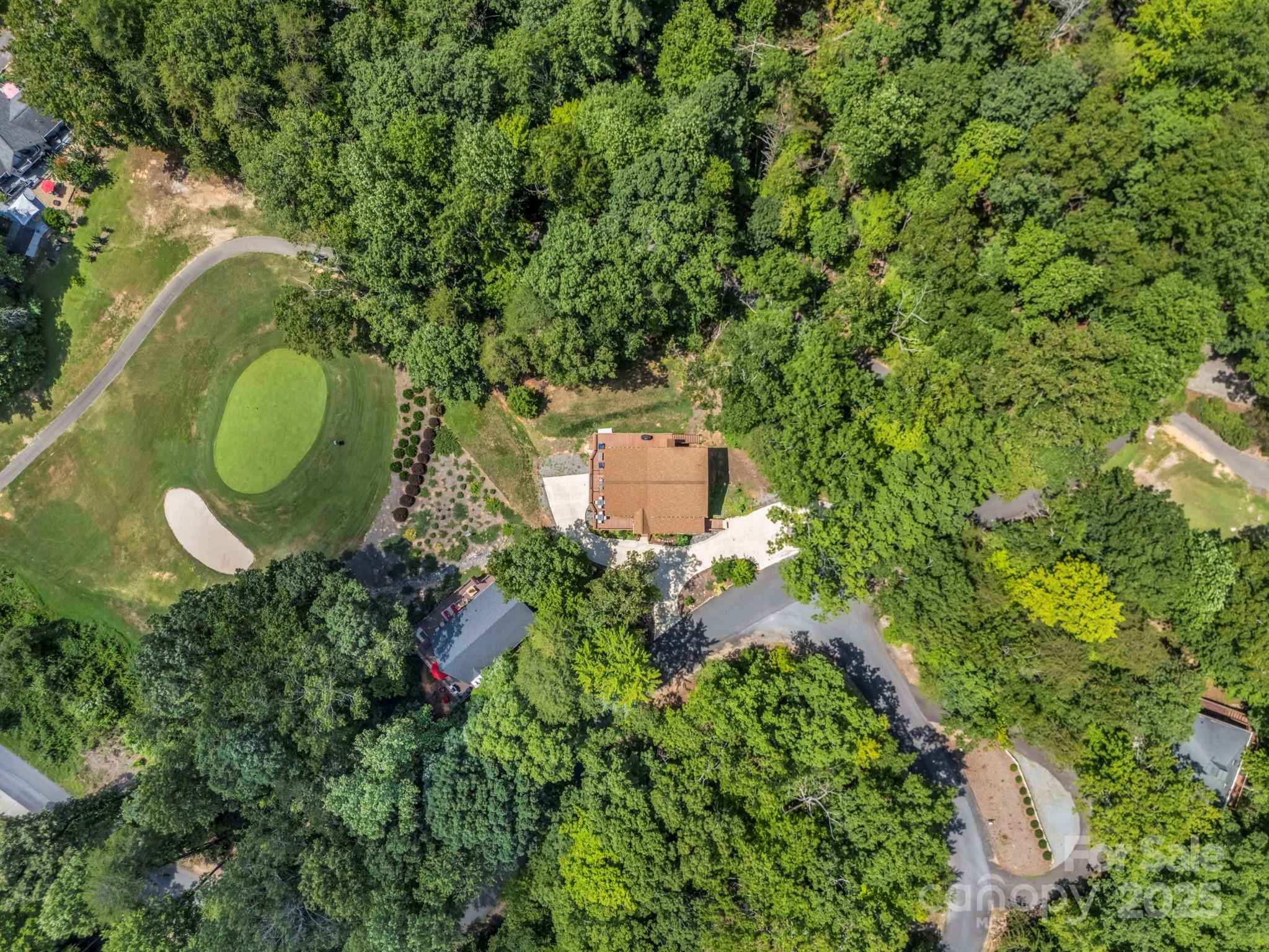 188 Fern Loop Lake Lure, NC 28746 - Photo 48 of 48 an aerial view of a house with a yard