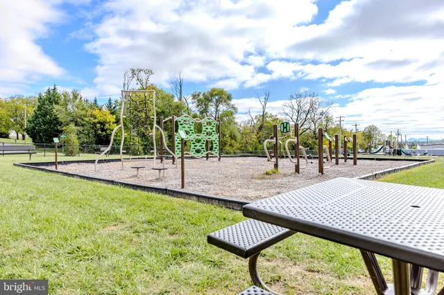 a view of a park with a slide