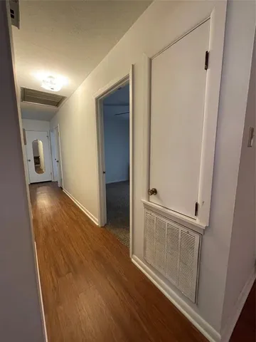 hallway with wooden floor