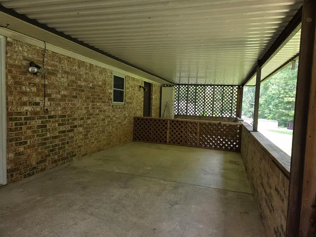 a bathroom with a sink a mirror and shower