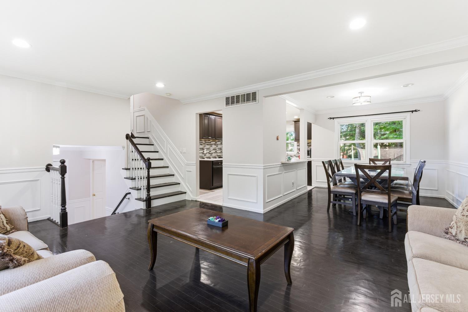 5 McKinley Street Edison, NJ 08820 - Photo 8 of 38 a living room with furniture and wooden floor