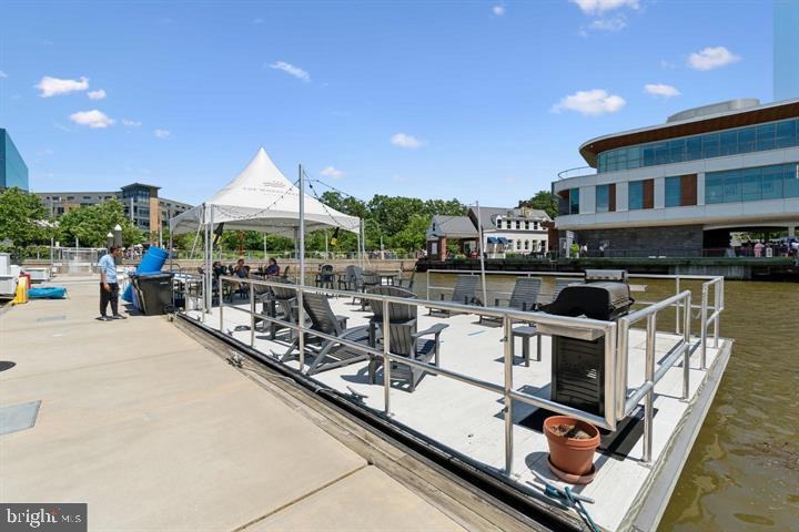 650 Wharf Street Southwest, Unit X48 Washington, DC 20024 - Photo 29 of 42 a view of a patio with swimming pool